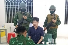 Phạm Mạnh Tân bị lực lượng chức năng bắt giữ.