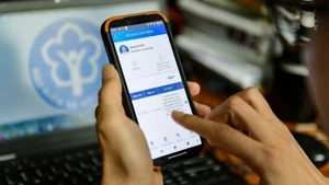 Sổ bảo hiểm xã hội điện tử sẽ thay thế cho sổ bảo hiểm xã hội giấy với nhiều lợi ích thiết thực. (Ảnh minh họa)
